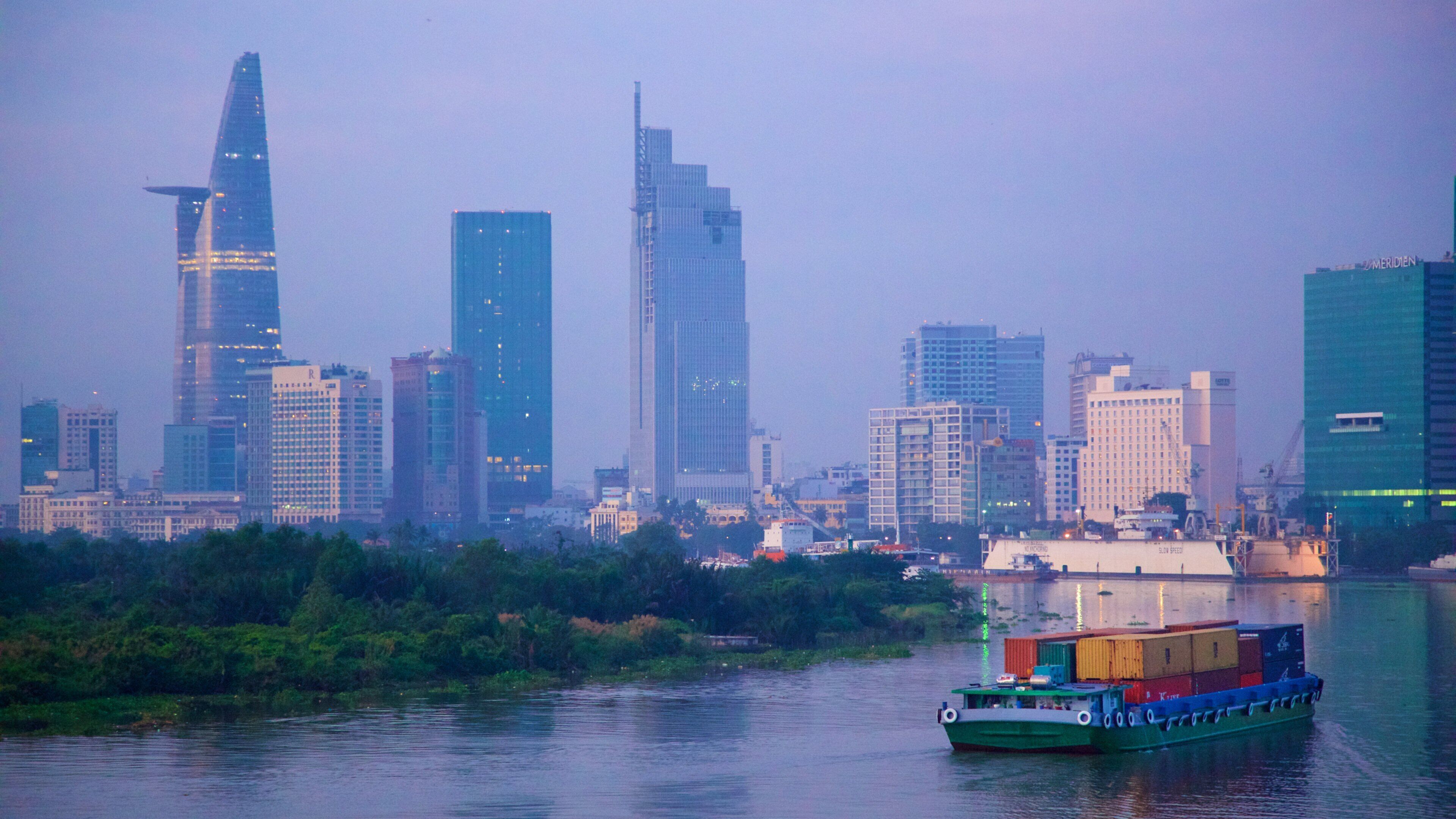 Saigon River featuring a city, boating and a river or creek