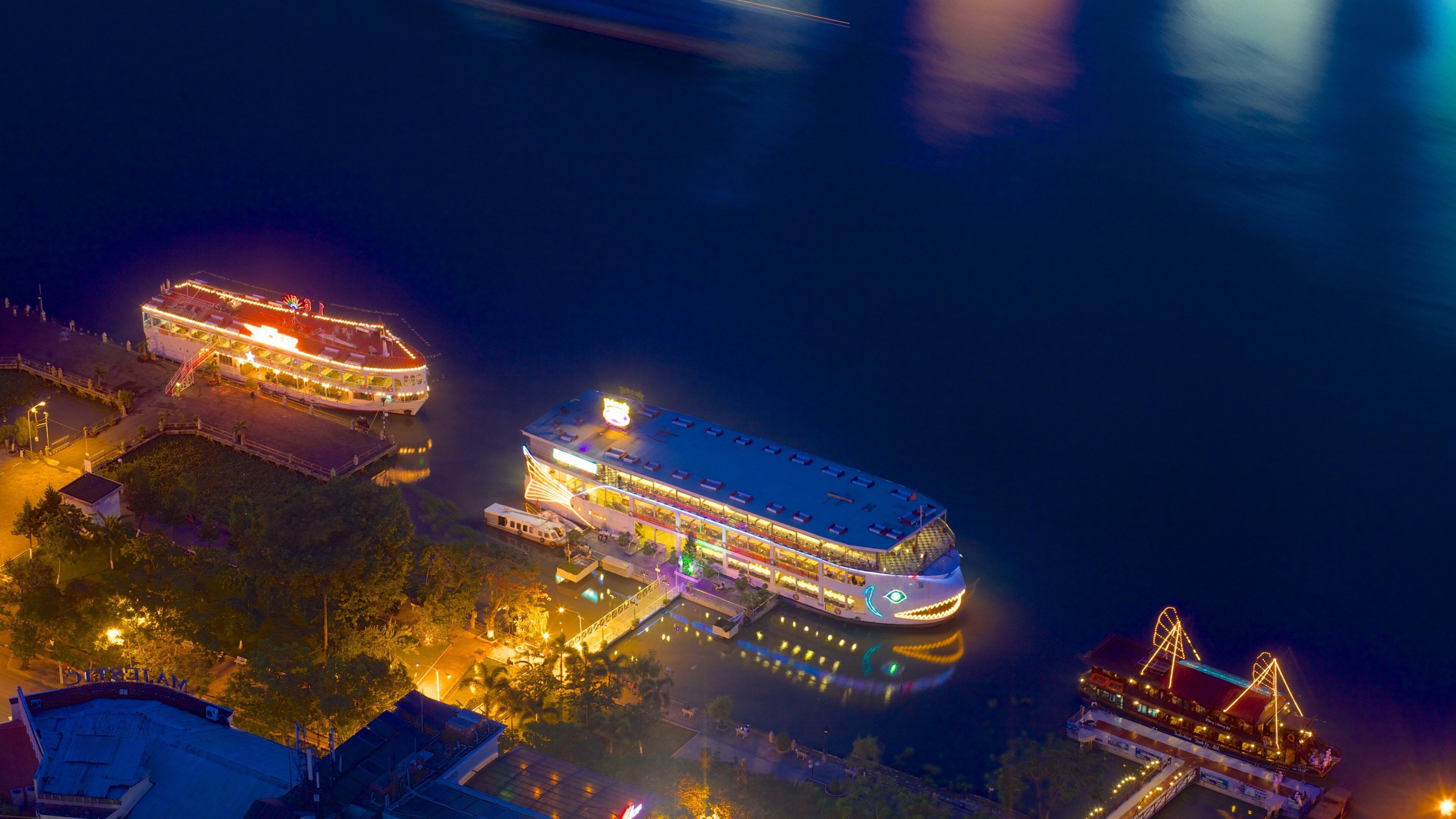 Saigon River showing a river or creek, cruising and night scenes