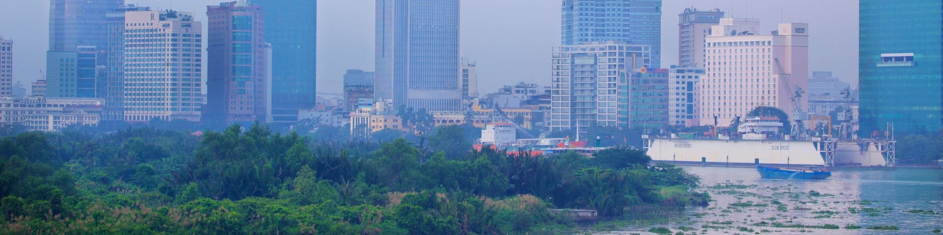Saigon River featuring skyline, a city and a skyscraper