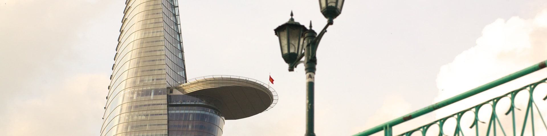 Saigon River showing city views, modern architecture and a high rise building
