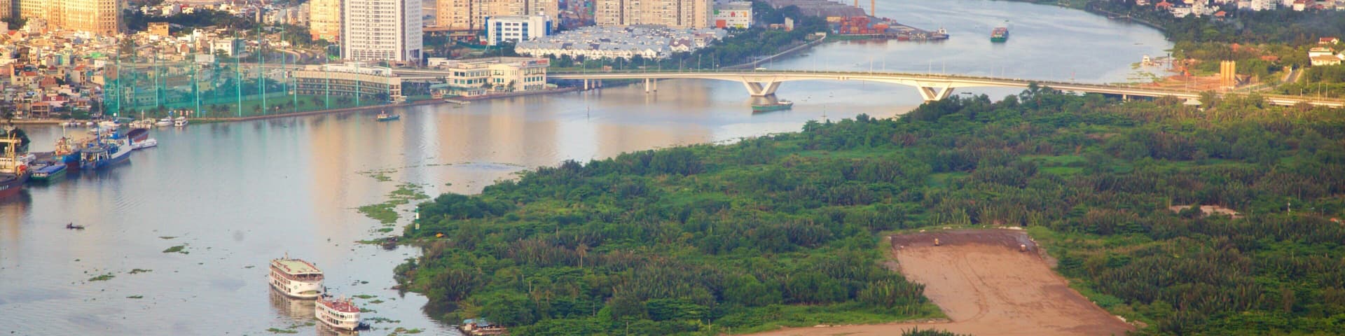 Saigon River featuring a city, boating and a river or creek