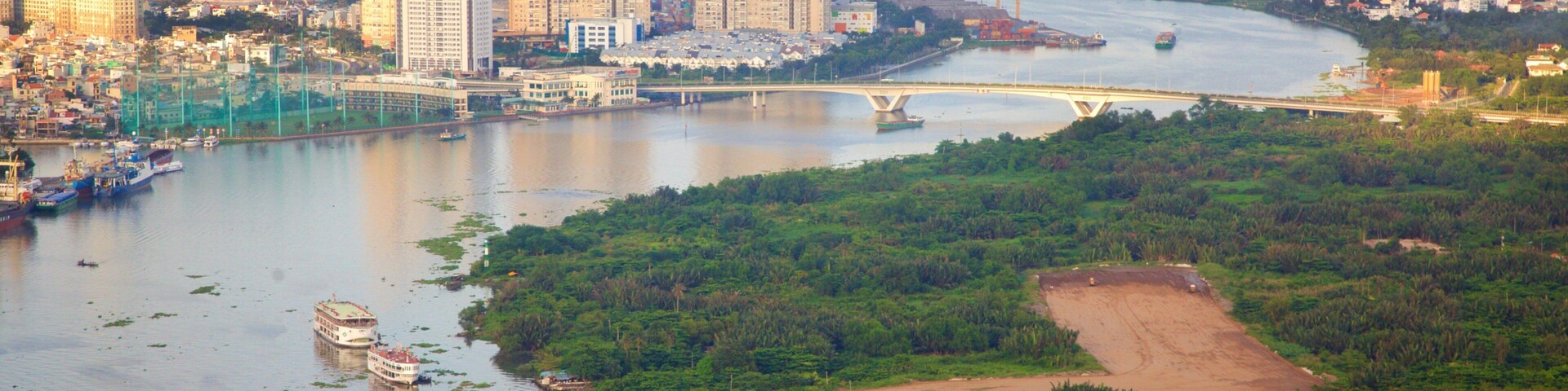 Saigon River featuring a city, boating and a river or creek