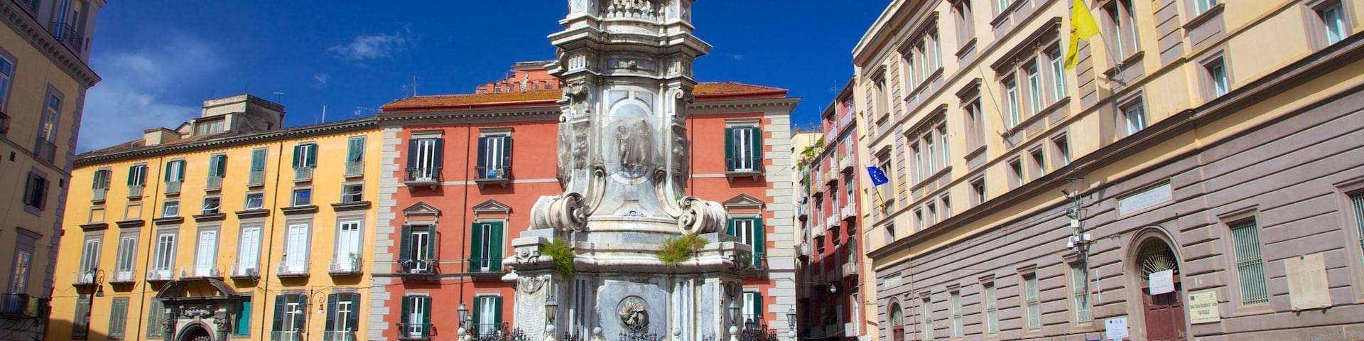 Church of Gesu Nuovo which includes street scenes and a monument