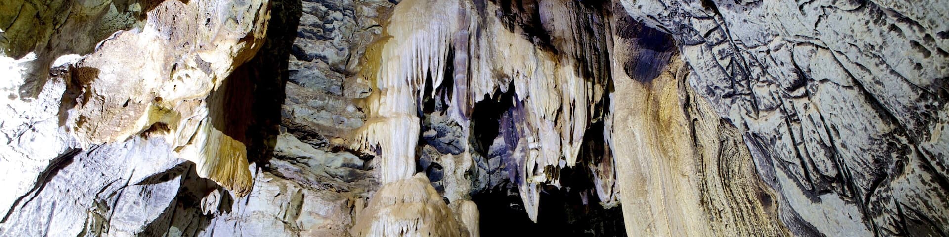 A cave with stalactites and stalagmites.