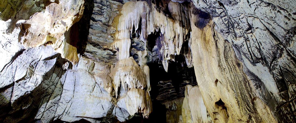 A cave with stalactites and stalagmites.