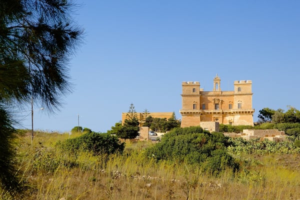 Selmun Palace which includes heritage architecture and a castle