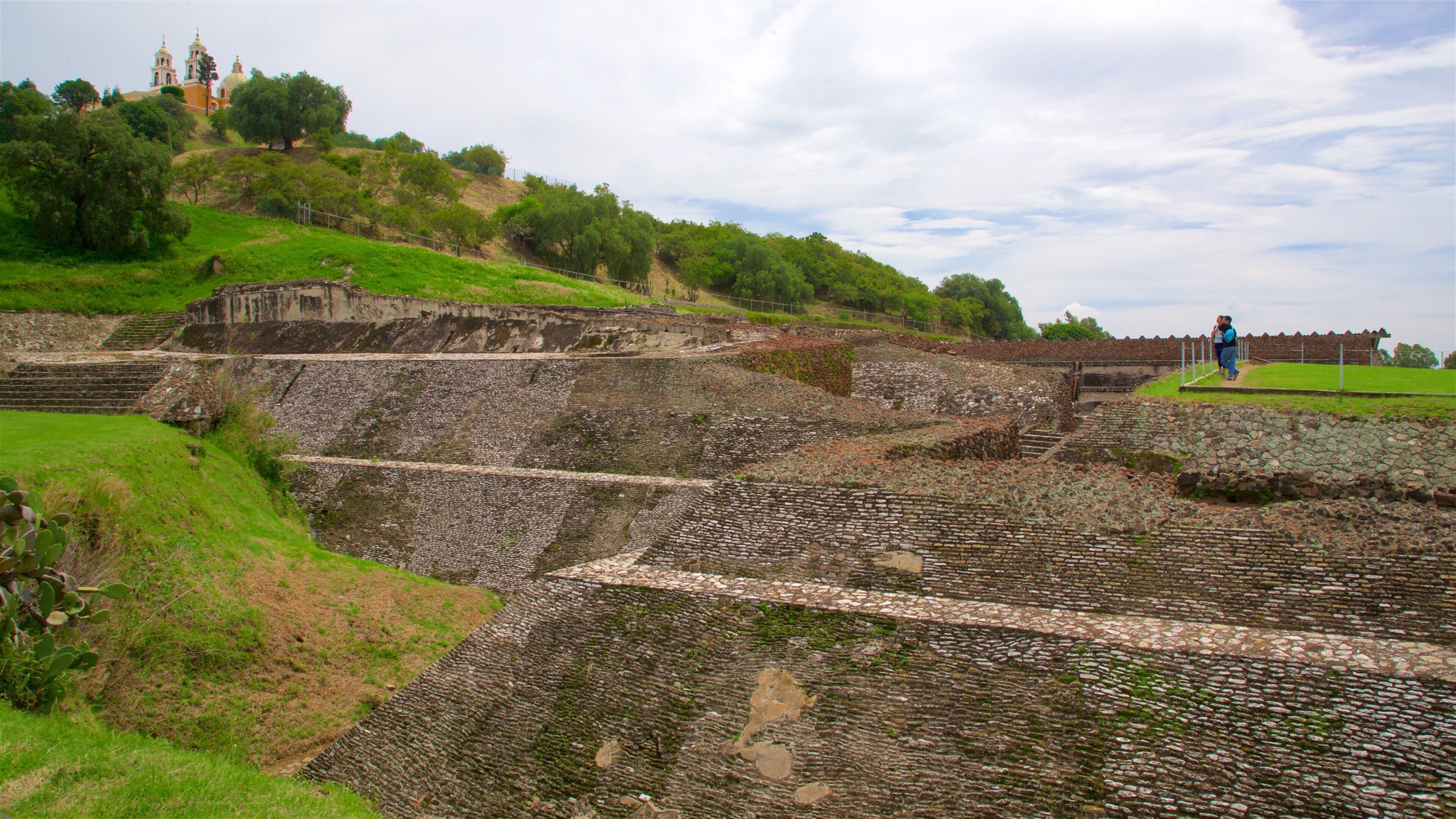 Great Pyramid of Cholula featuring heritage elements and building ruins