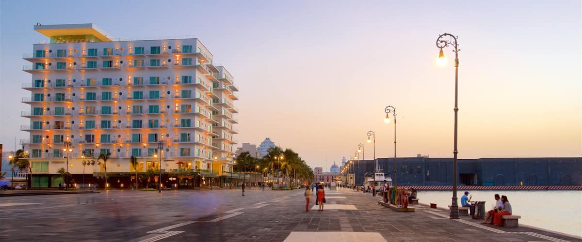 Veracruz Harbour which includes a square or plaza, a sunset and a bay or harbor