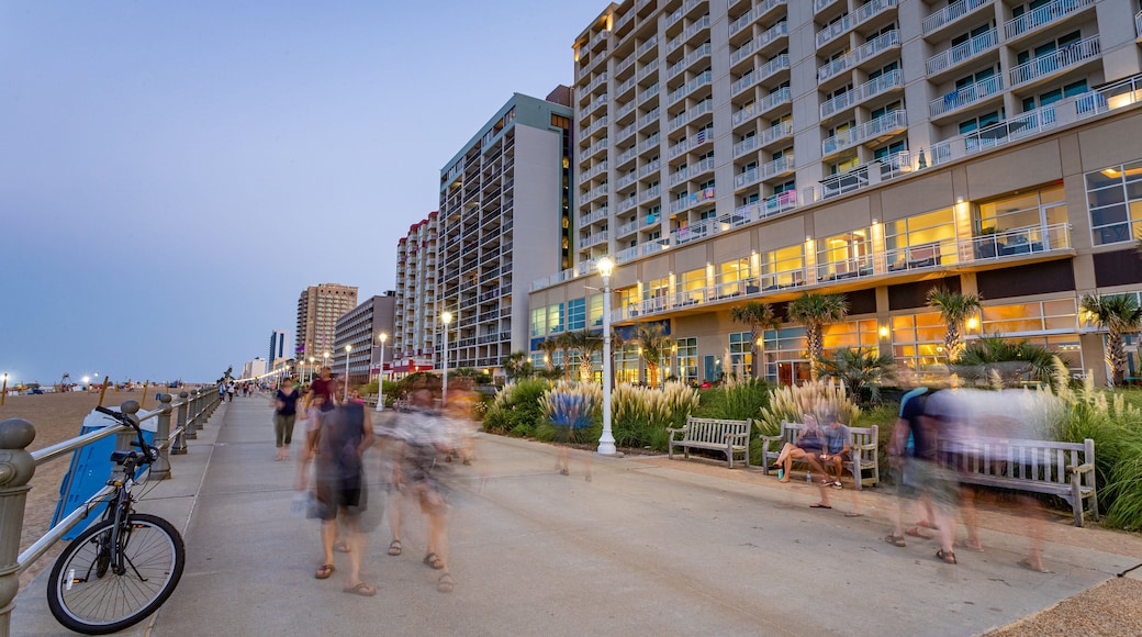 Virginia Beach Boardwalk featuring a sunset and a coastal town