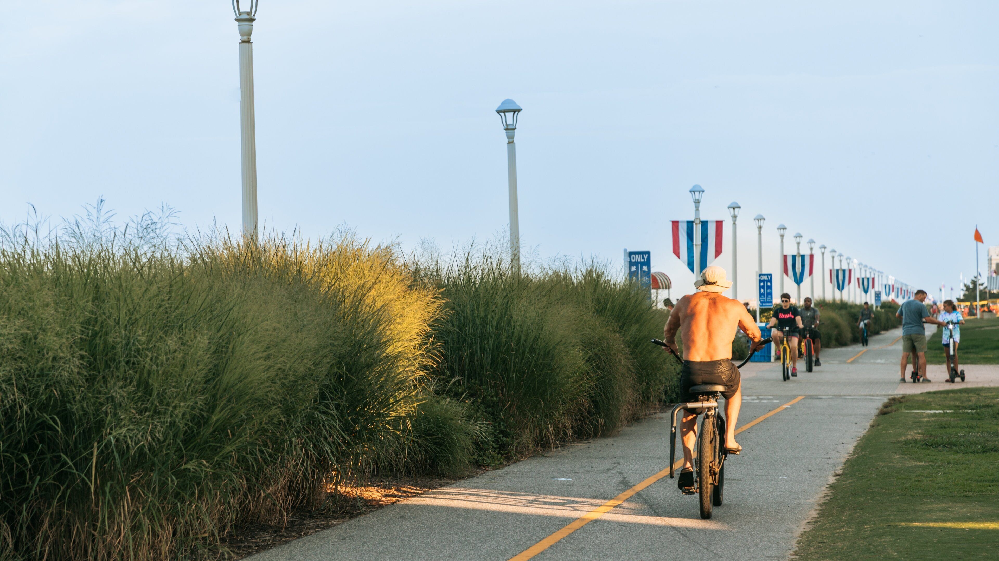 Virginia Beach Boardwalk which includes cycling as well as an individual male