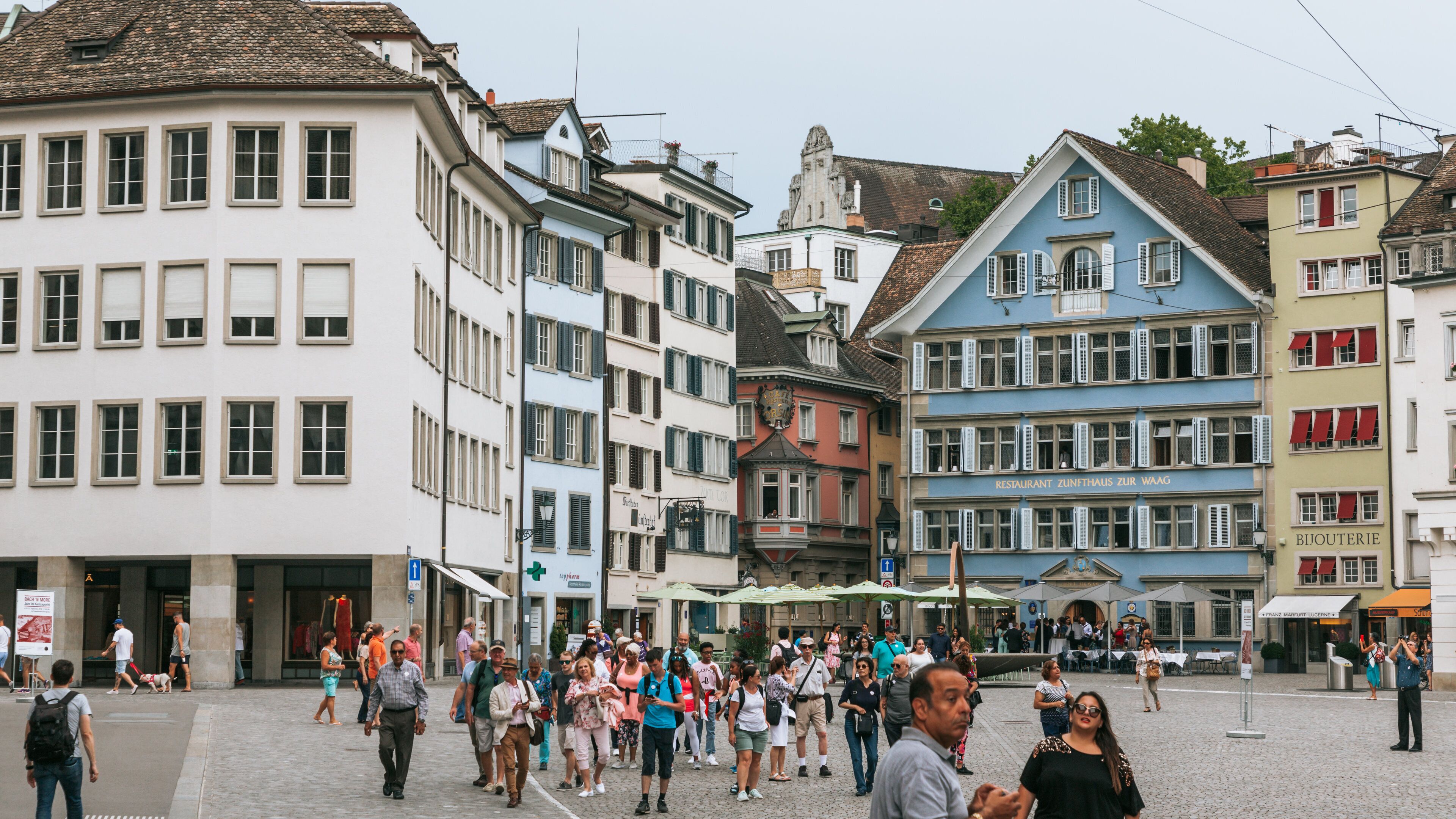 Old Town Zürich featuring a city, a square or plaza and street scenes