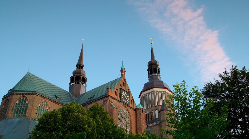 St. Mary\'s Church Stralsund showing a sunset and heritage architecture