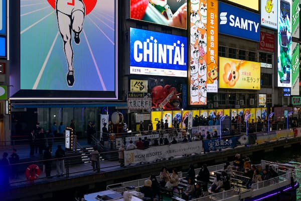 Glico running man and Night Reflections Along Dotonbori Canal, Osaka, Japan