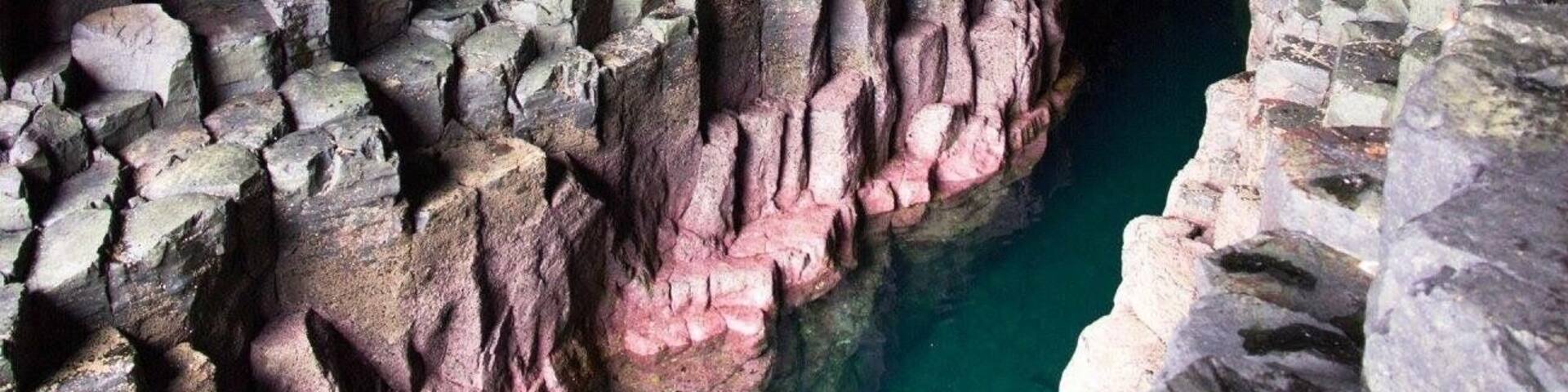 A cave with stalactites and stalagmites.