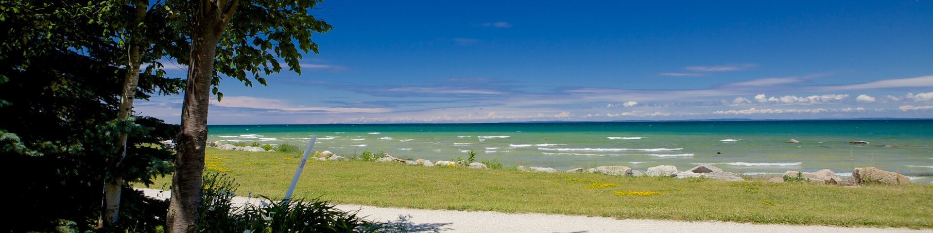 Sunset Point Park which includes a park and general coastal views