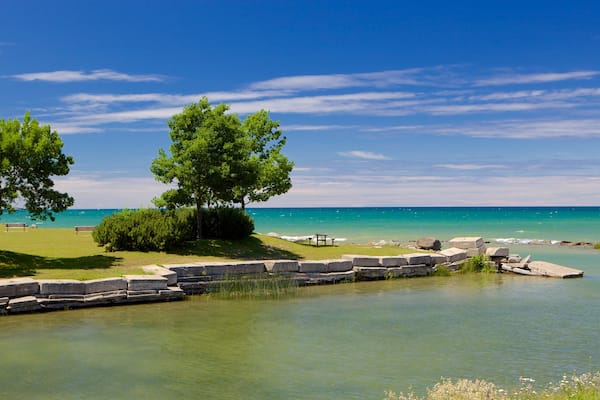 Sunset Point Park which includes general coastal views and a park