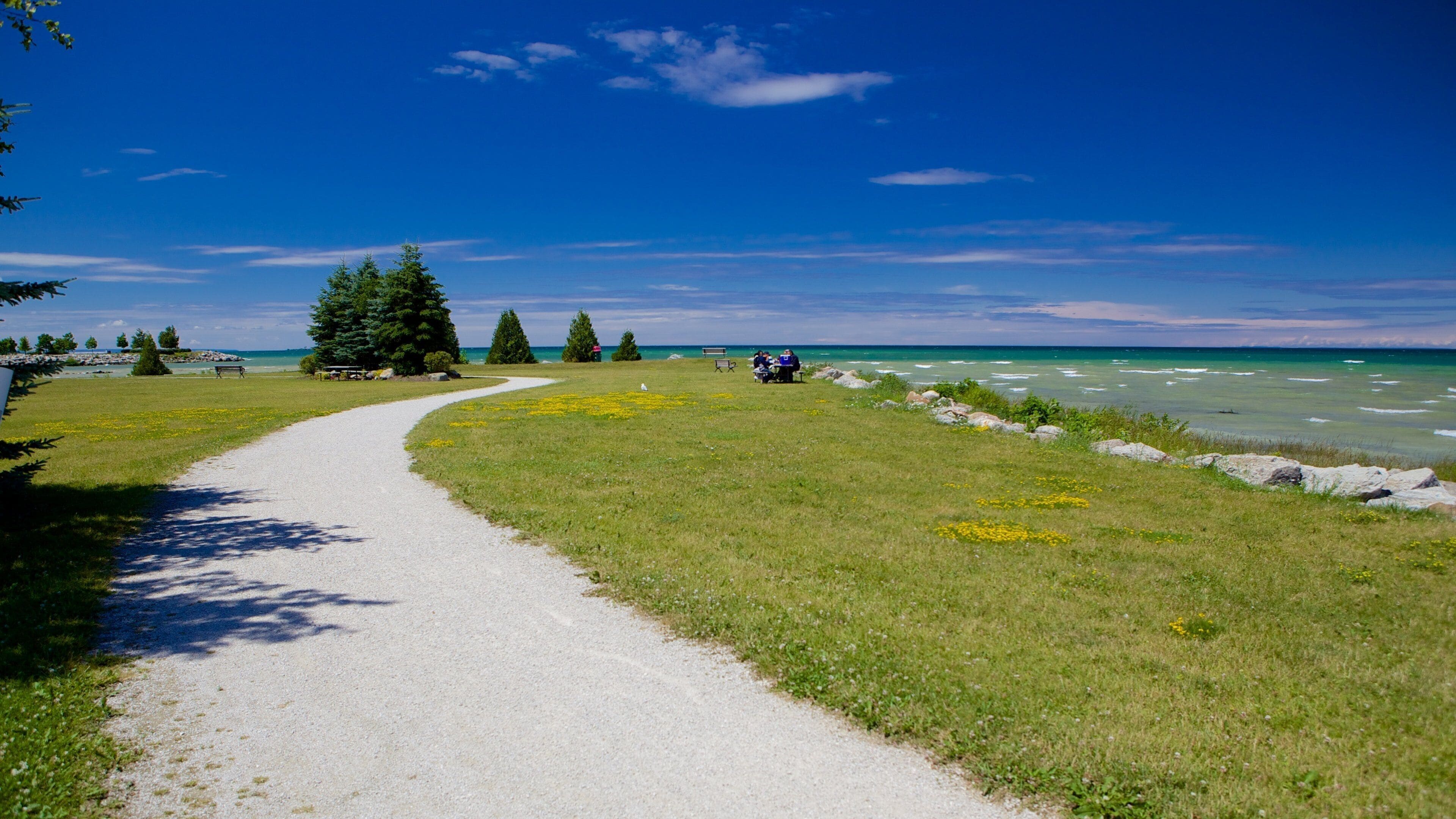 Sunset Point Park fasiliteter samt kyst og hage