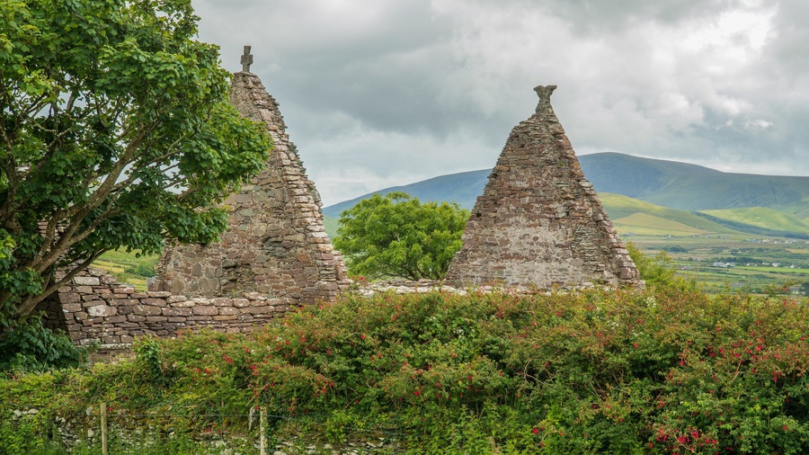 Kilmalkedar Church which includes heritage elements and a ruin