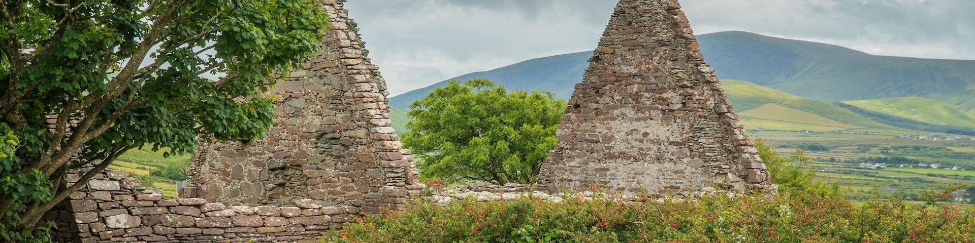 Kilmalkedar Church which includes heritage elements and a ruin