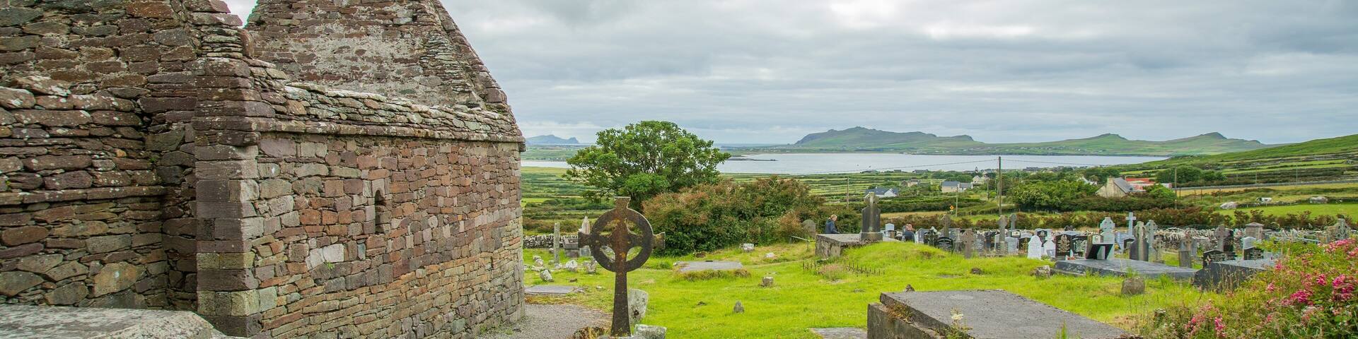Kilmalkedar Church which includes a cemetery, heritage elements and a ruin