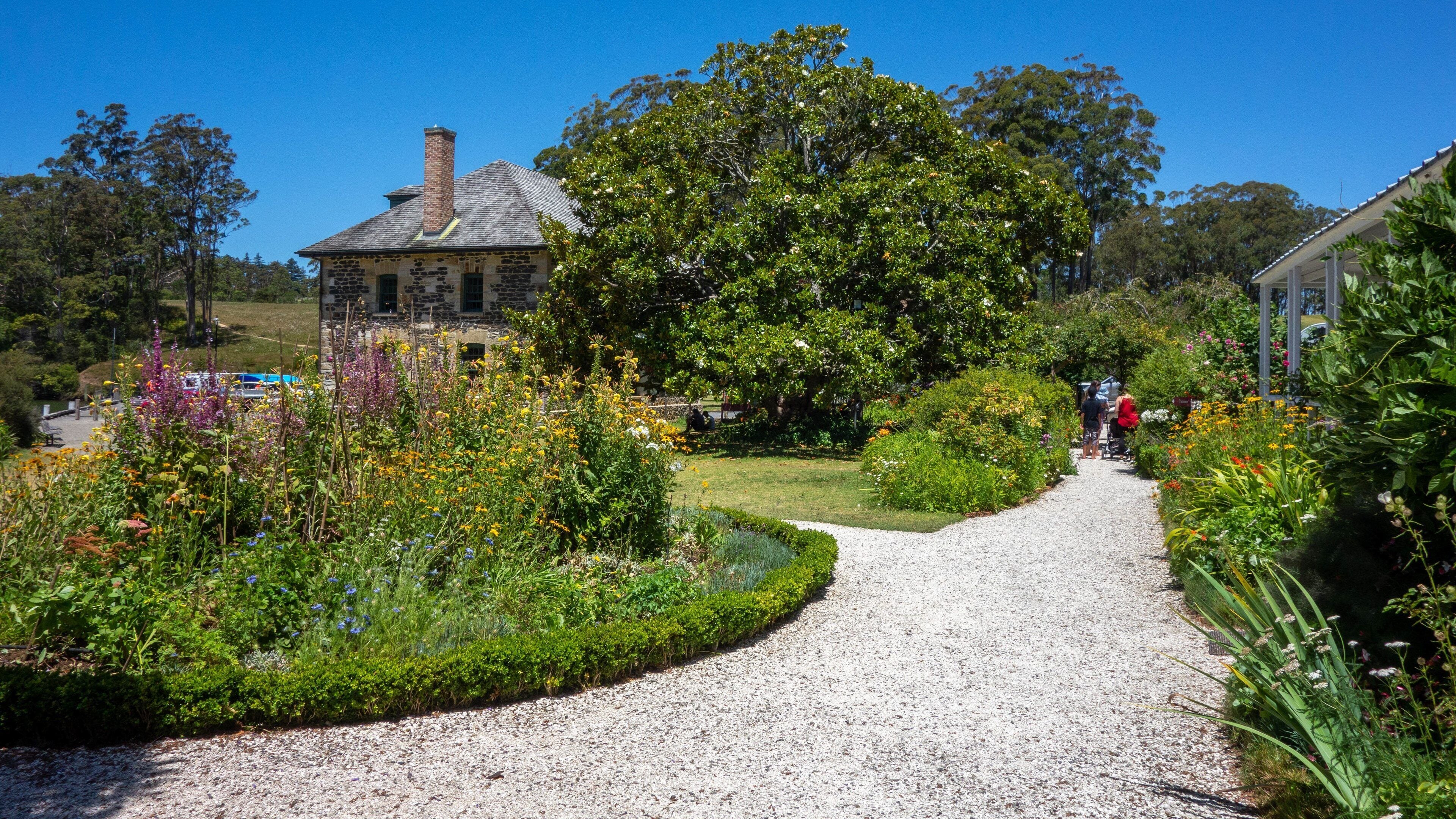 Stone Store which includes wildflowers and a garden