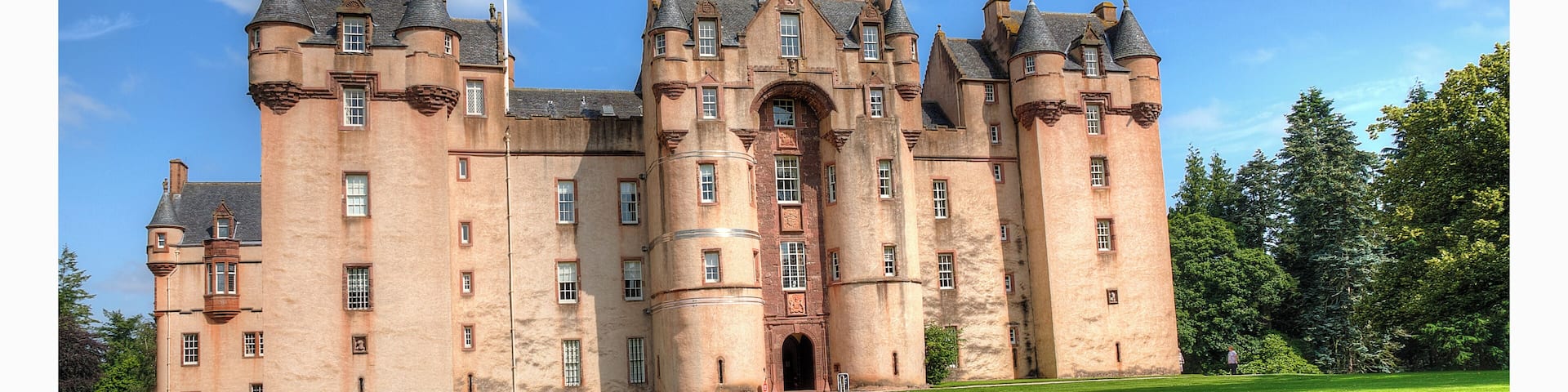 a stunning Scottish castle with beautiful grounds and lovely treasures to discover