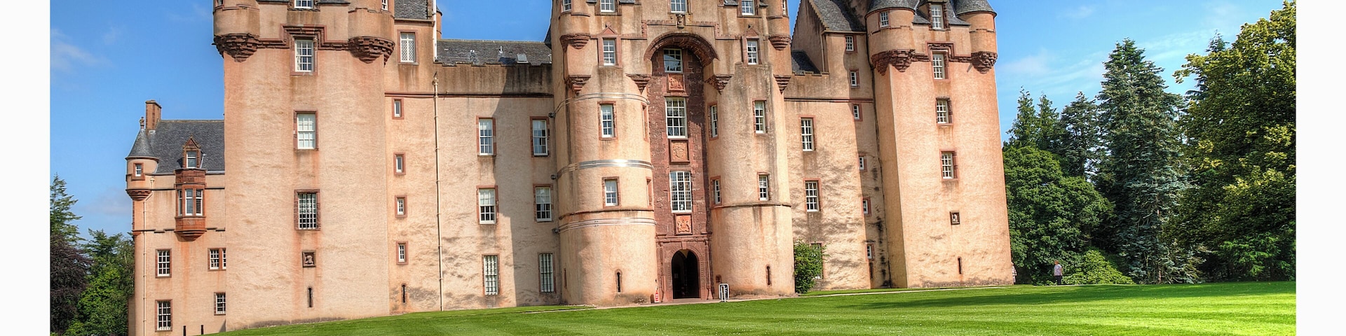 a stunning Scottish castle with beautiful grounds and lovely treasures to discover