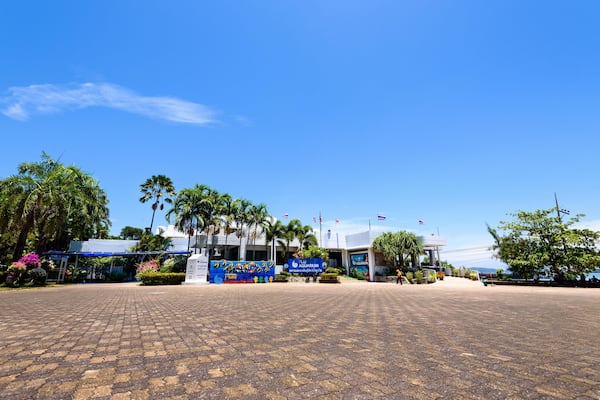 PHUKET, THAILAND - APRIL 29 2015: Front exterior building of Phuket Aquarium and tourists who come to visit, is part of the inte