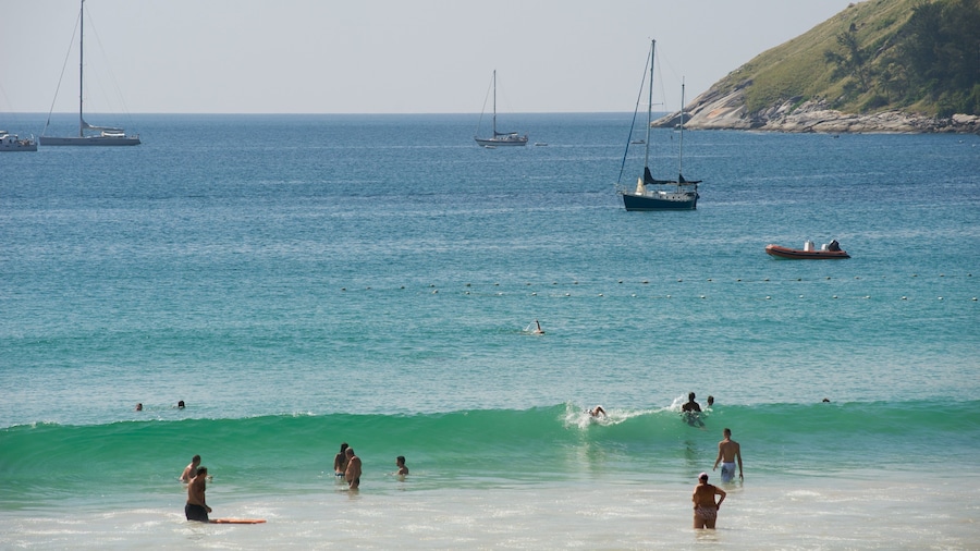Nai Harn Beach which includes a beach, general coastal views and tropical scenes
