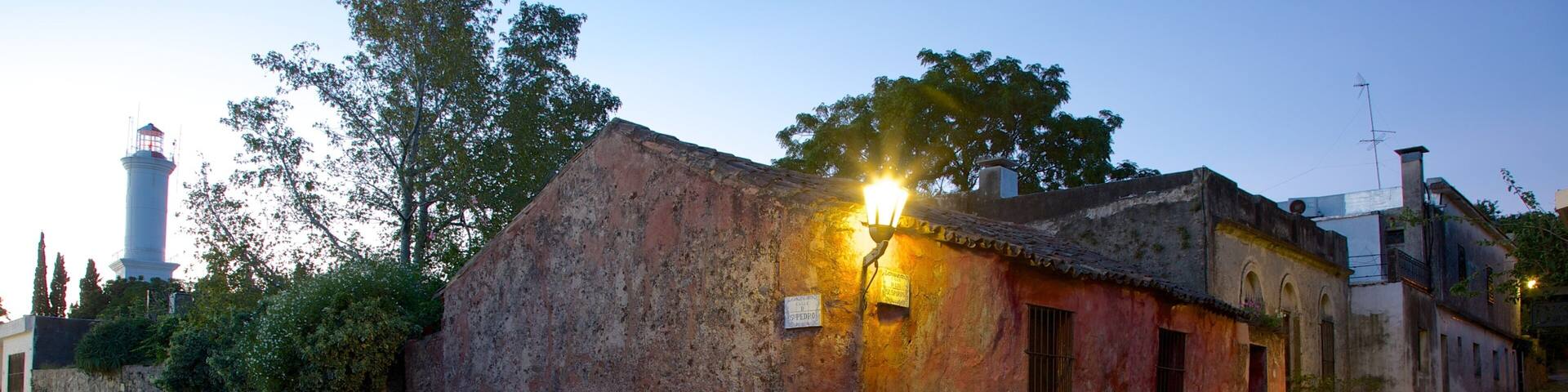 Street of Sighs which includes a small town or village, a house and street scenes