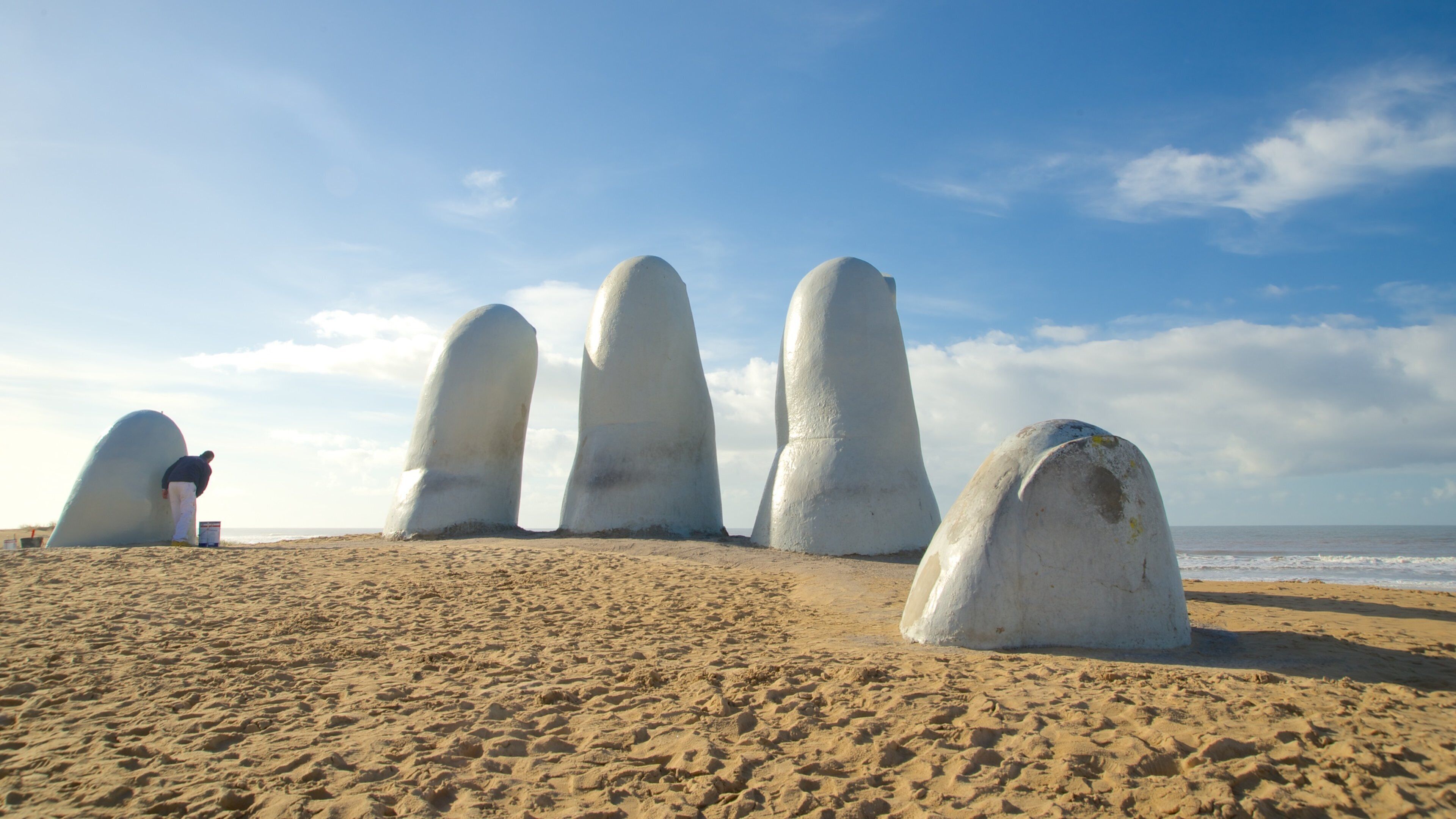 Brava Beach which includes a statue or sculpture, general coastal views and outdoor art