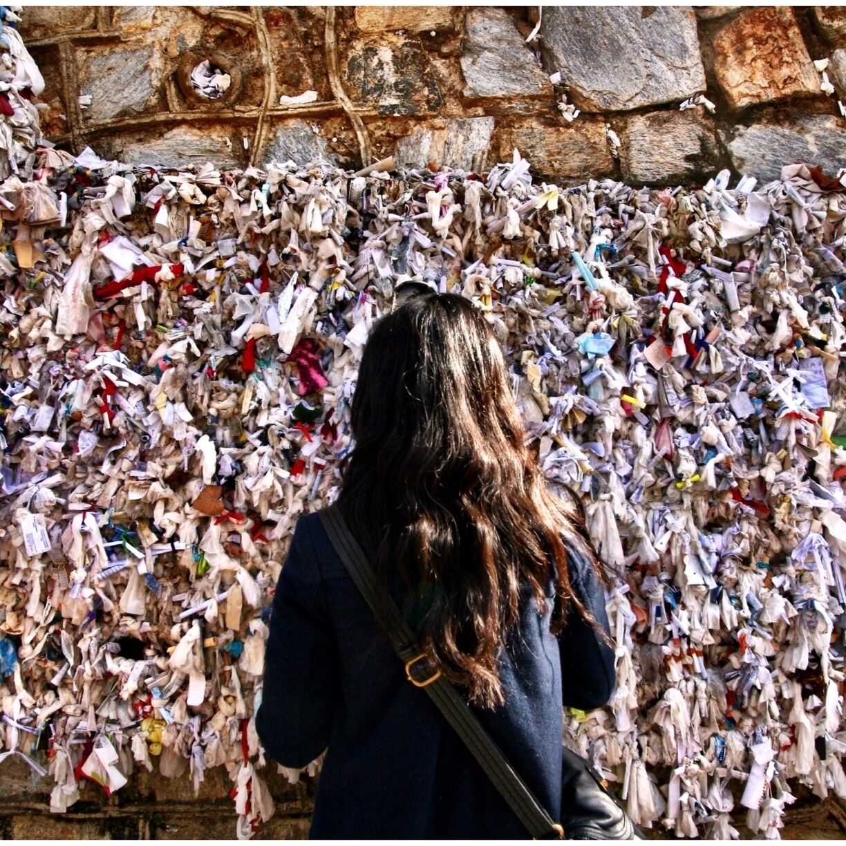 If you visit the House of the Virgin Mary in Ephesus, remember to bring paper/ cloth and a pen. After you exit the house you go down the terrace where you may drink from the holy water fountain and write a wish to add to this wall. It was fun to see what other visitors from around the world wished for. One note translated from Mandarin read, "I wish for a handsome husband and money." 