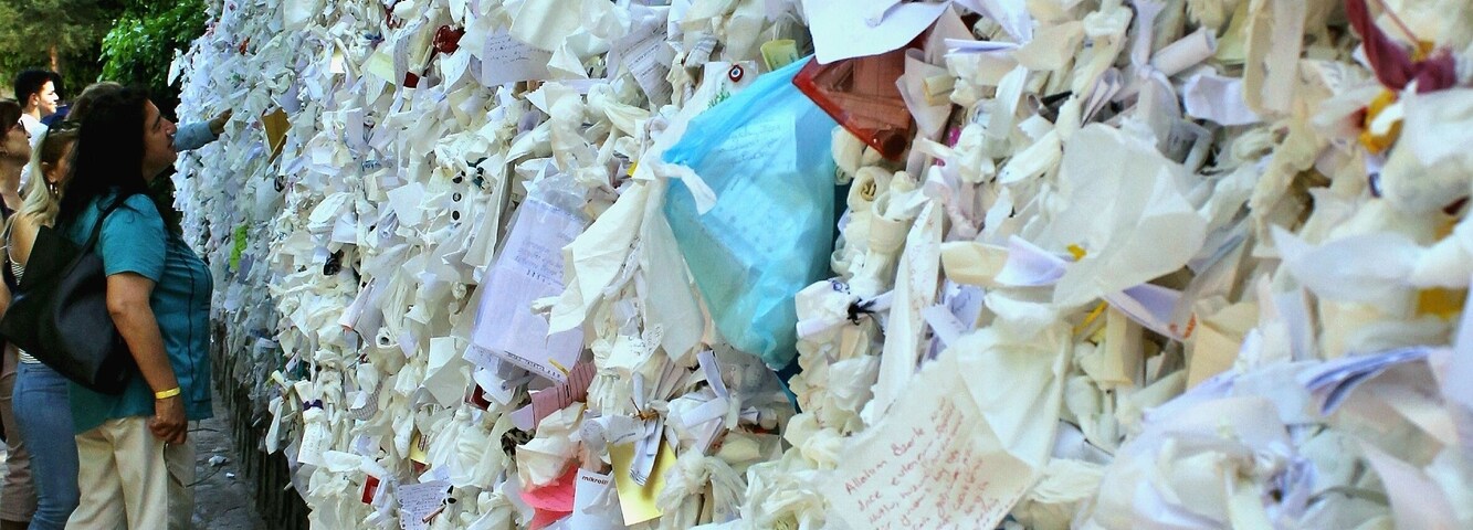 Hundreds of thousands  wishful messages  put on the wall written by hundreds of thousands people of all religions
#Details
#Faith