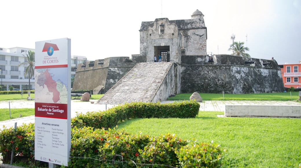 Bastion of Santiago Museum showing a park, signage and heritage elements