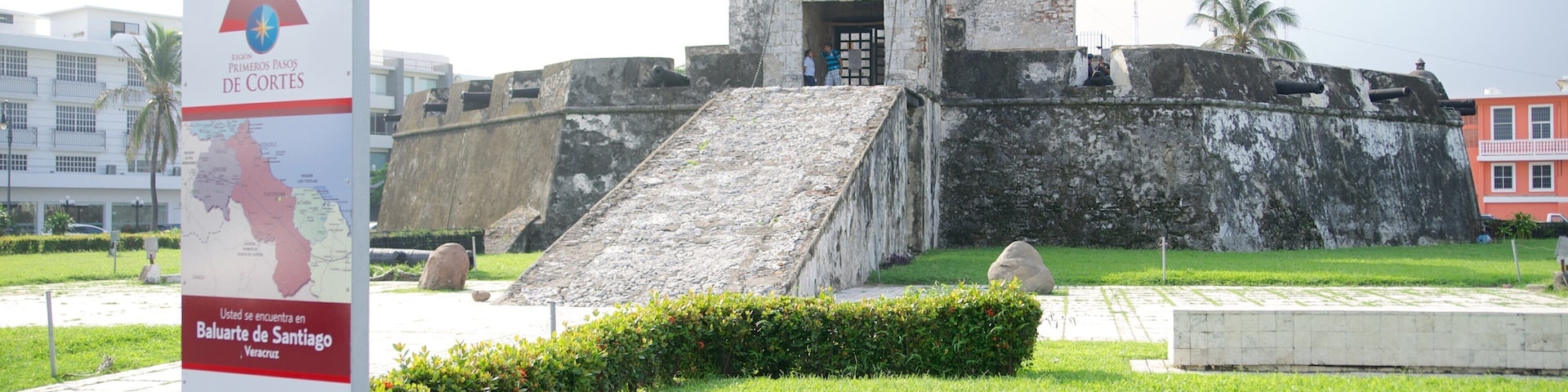 Bastion of Santiago Museum showing signage, heritage elements and a garden