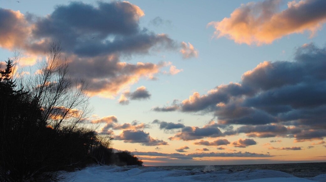 February isn't the best time to go to the beach in Buffalo NY, but you get a different kind of vibe from the beach when it's covered in 3ft of snow and the icy water splashing against the forming icebergs.
Blue and Orange were being perfectly contrasted in the sky and on the land. It was a beautiful sunset and I was so happy that i was able to capture this moment.
Buffalo NY isn't where you are going to get your perfect paradise tropical photos, but standing on the snow covered beach, watching the sunset on the land, that was paradise to me.
#BeachBound
#Beach #Winter #snow