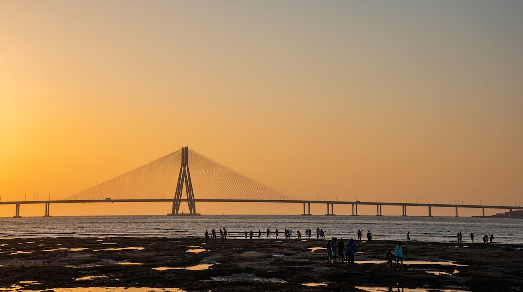 Bandra-Worli Sea Link showing a sunset, a bridge and a river or creek