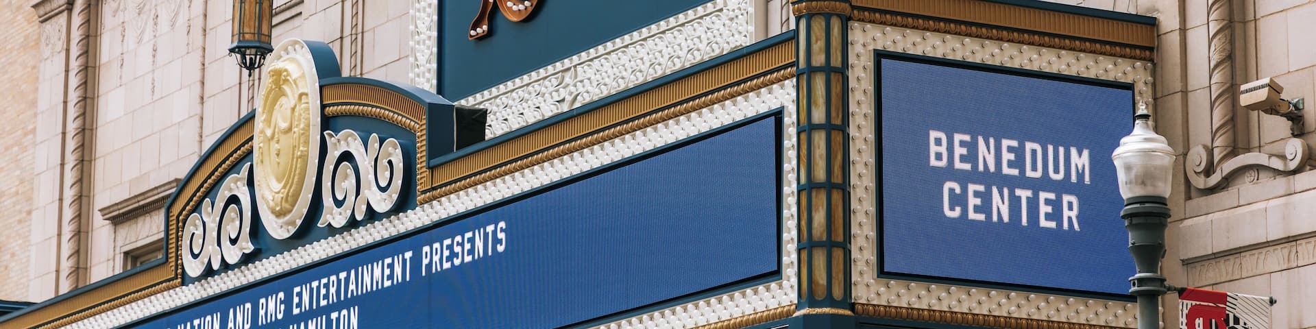 A theater marquee with ornate designs and the name 'BENEDUM CENTER' displayed.