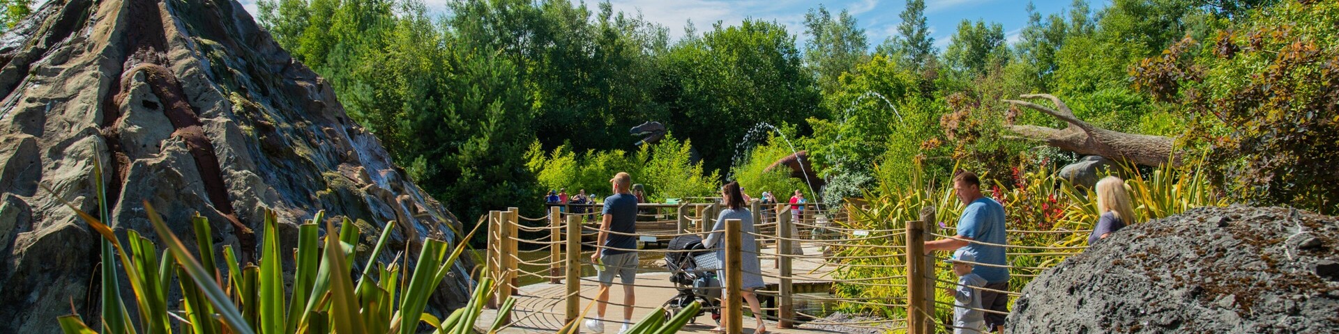 Blackpool Zoo which includes a pond as well as a small group of people