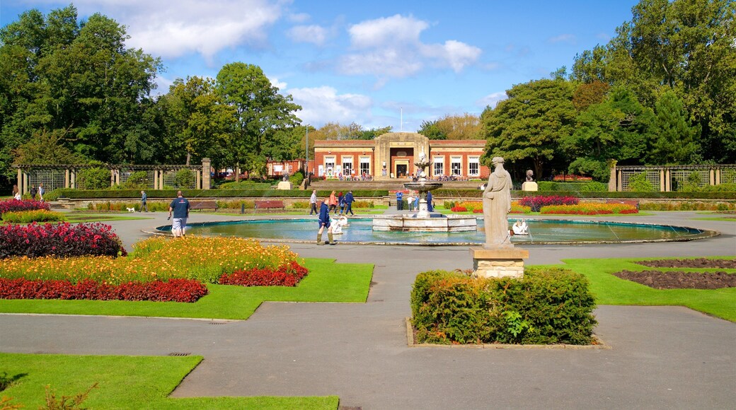 Stanley Park which includes a fountain, a garden and wildflowers