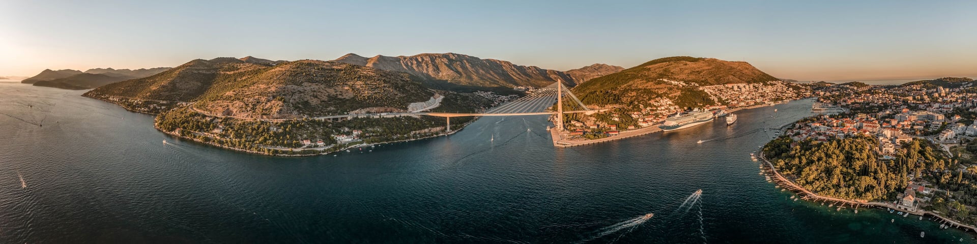 Aerial panorama drone shot of Dubrovnik bridge at Port Gruz in Lapad Adriatic sea in Croatia summer sunset