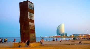 Barceloneta Beach showing modern architecture, a sandy beach and outdoor art