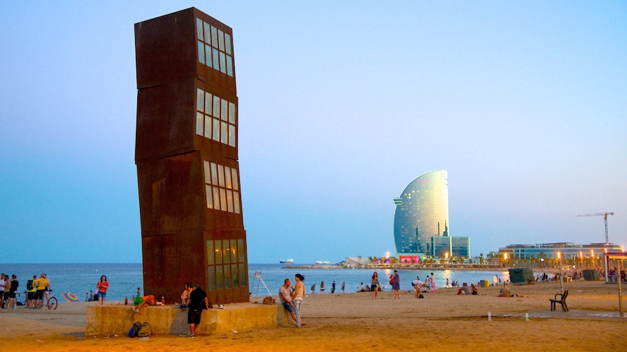Barceloneta Beach showing modern architecture, a sandy beach and outdoor art