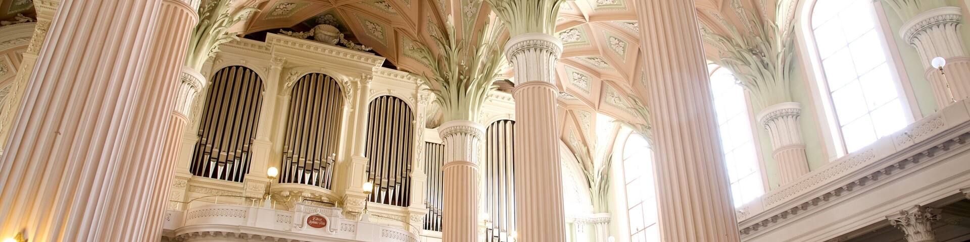 St. Nicholas Church featuring a church or cathedral and interior views