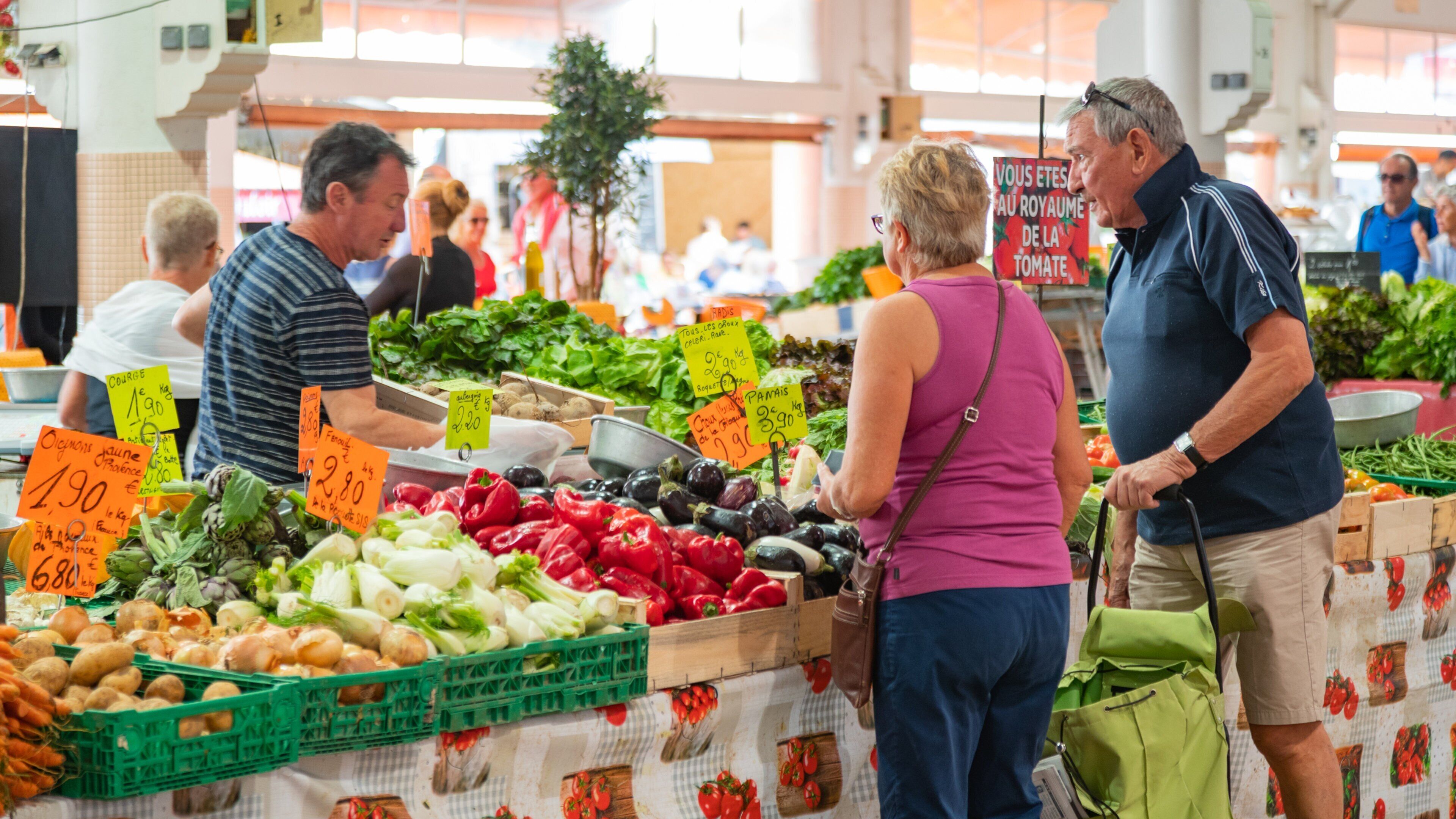 Forville Provencal Food Market which includes food, markets and interior views