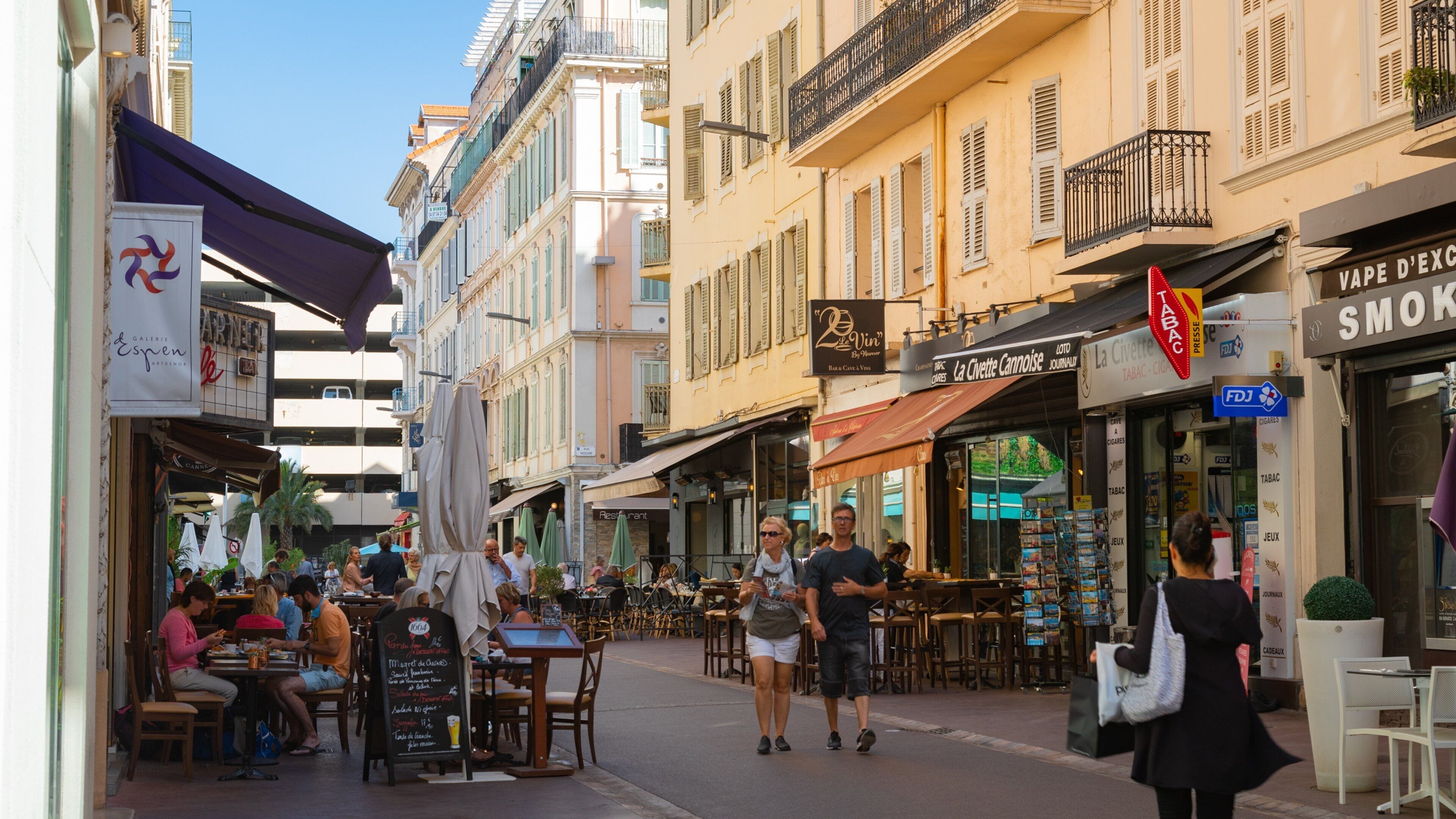 Rue d\'Antibes featuring street scenes as well as a couple