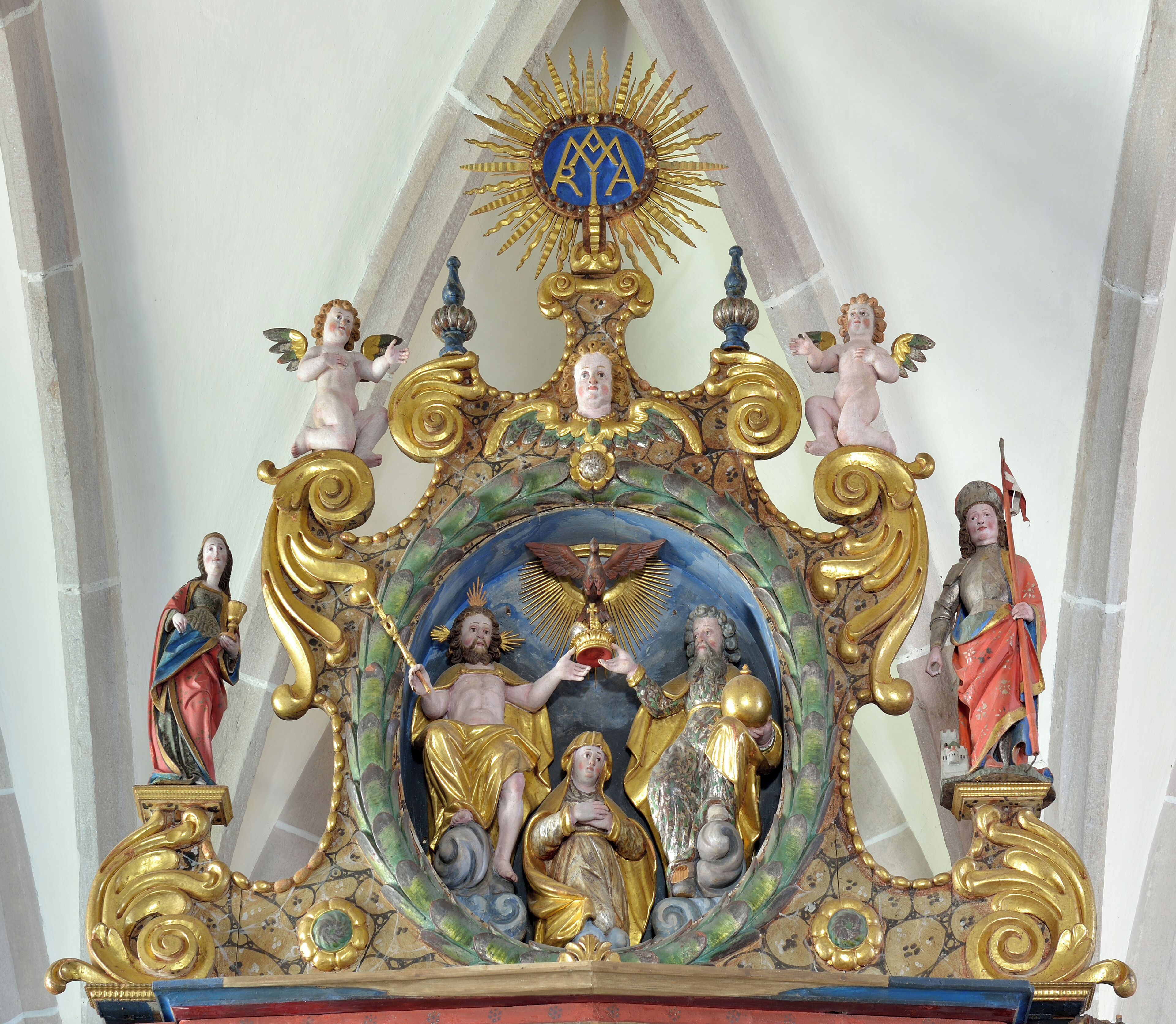 A detailed religious icon with gold accents and figures, set against a white background.