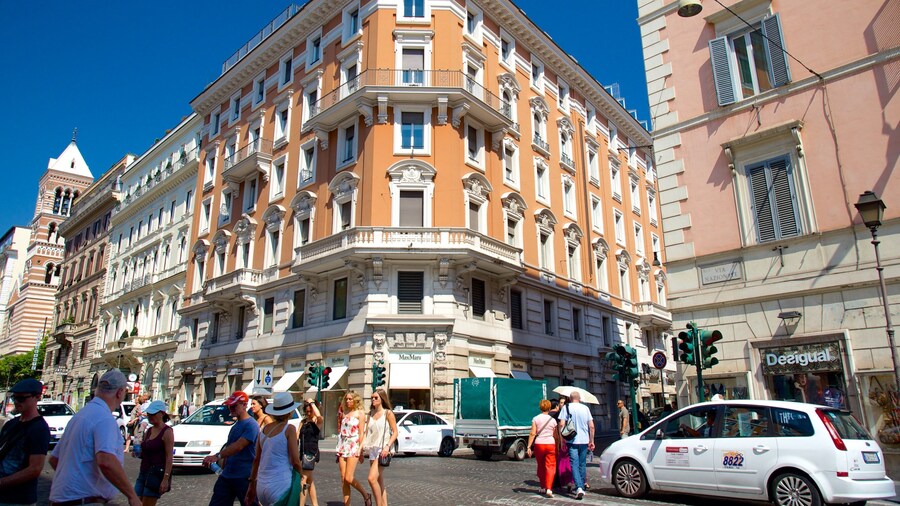 Via Nazionale showing a city and street scenes as well as a small group of people