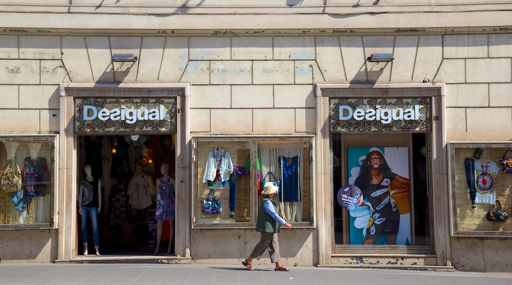 Via Nazionale which includes shopping, street scenes and a city