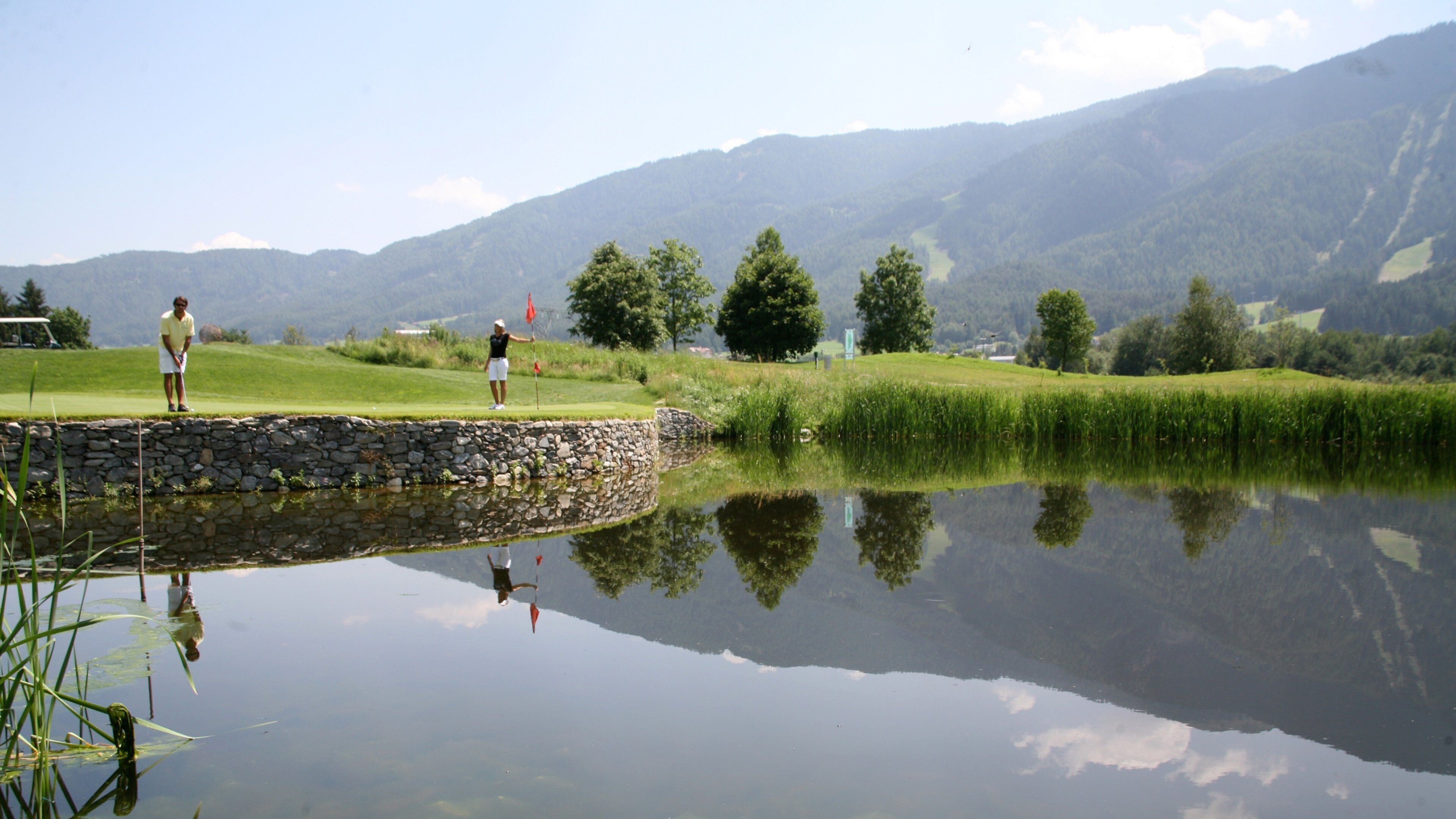 Kronplatz Ski Area which includes a pond and golf